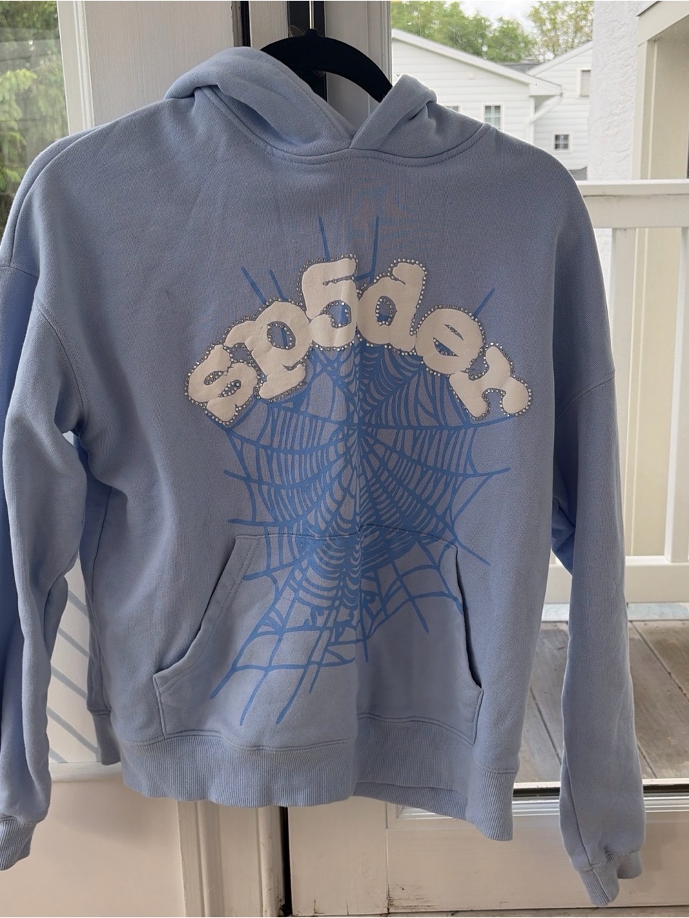 Sp5der Light Blue Graphic Pullover Hoodie with Spiderweb Design